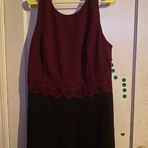 Never worn burgundy and black shorts romper.